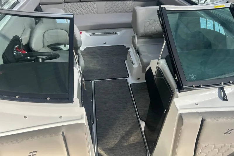 Slide: The Image of 2026 Four Winns H2 boat interior with modern seating and sleek design. - 32