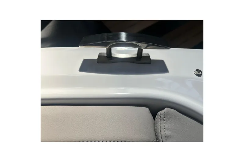 Slide: The Image of 2026 Four Winns H2 boat cleat and upholstery detail in sunlight. - 33