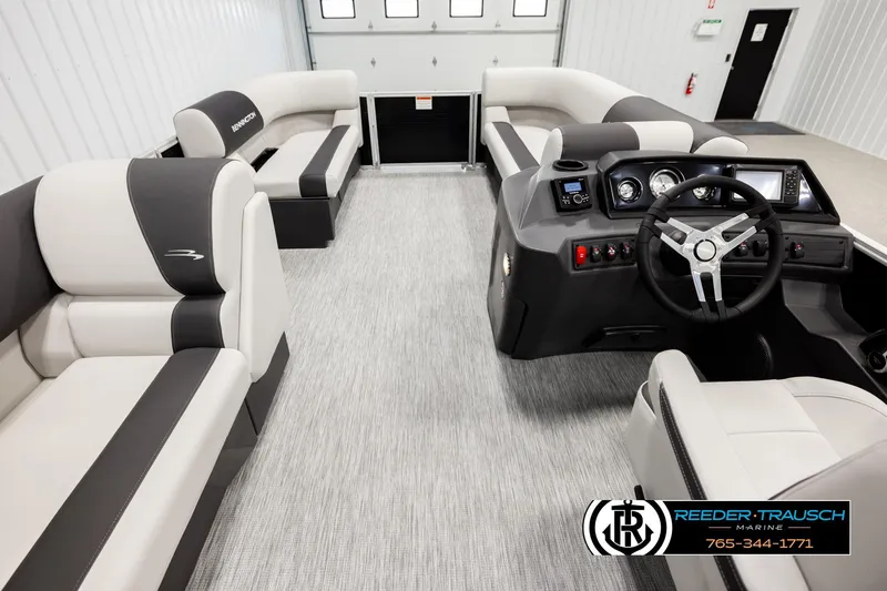 Slide: The Image of 2026 Bennington SLSF pontoon boat interior with modern seating and steering console. - 17