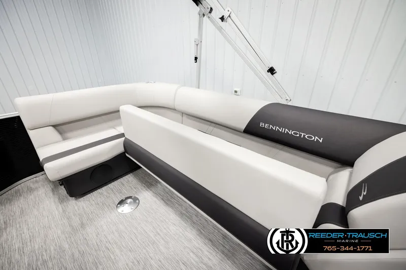 Slide: The Image of 2026 Bennington SLSF boat interior with sleek seating and modern design. - 21