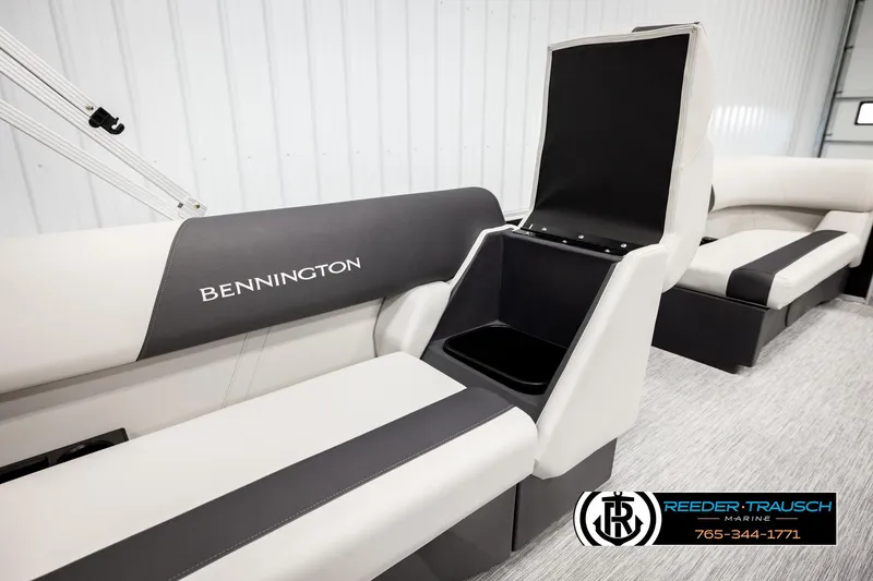 Slide: The Image of 2026 Bennington SLSF boat interior with storage compartment, featuring sleek seating design. - 25