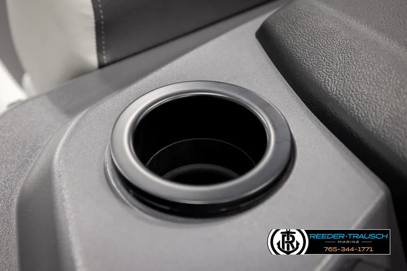 Slide: The Image of Cup holder in 2026 Bennington SLSF boat interior, featuring sleek design and textured surface. - 31