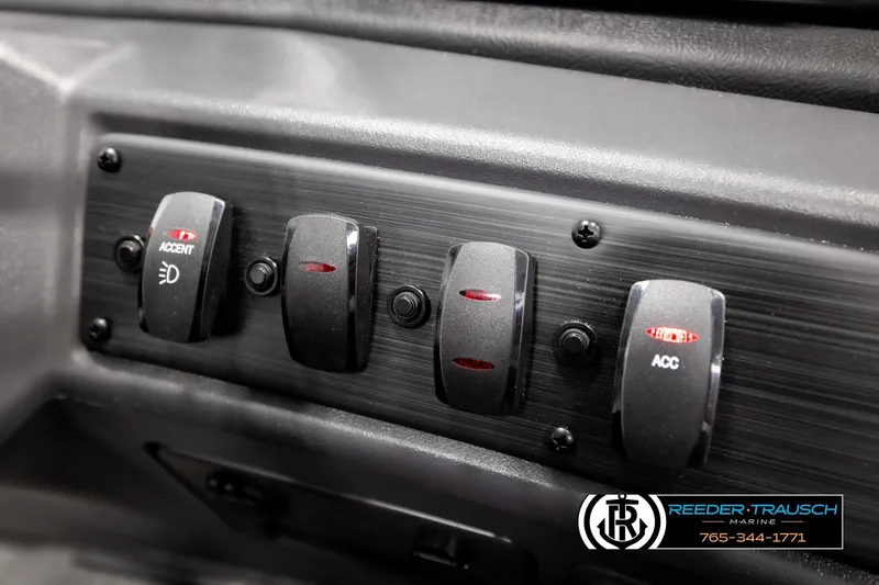 Slide: The Image of Control panel of 2026 Bennington SLSF boat with accent and accessory switches. - 34