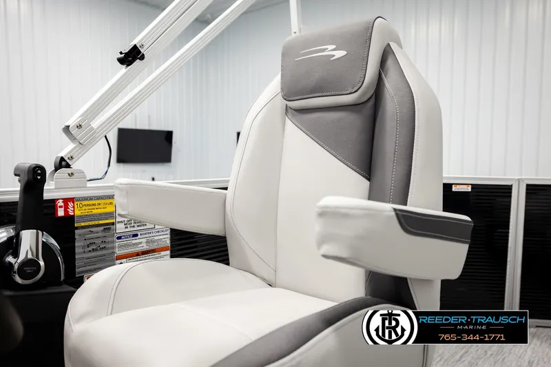 Slide: The Image of Captain's chair in 2026 Bennington SLSF boat, featuring sleek design and modern controls. - 37