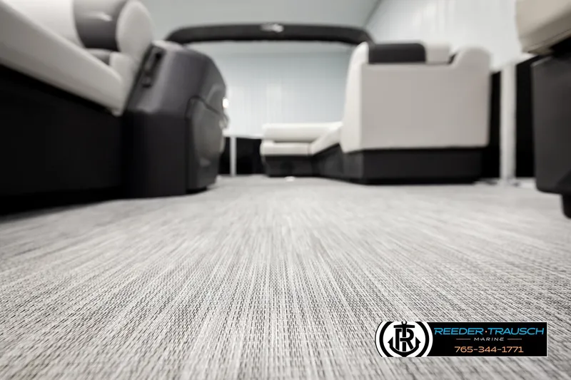 Slide: The Image of Luxurious interior of 2026 Bennington SLSF pontoon boat with plush seating and modern flooring. - 44