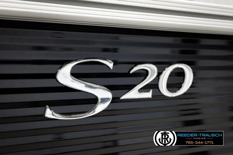 Slide: The Image of 2026 Bennington SLSF boat with "S20" emblem, Reeder-Trausch Marine logo visible. - 46