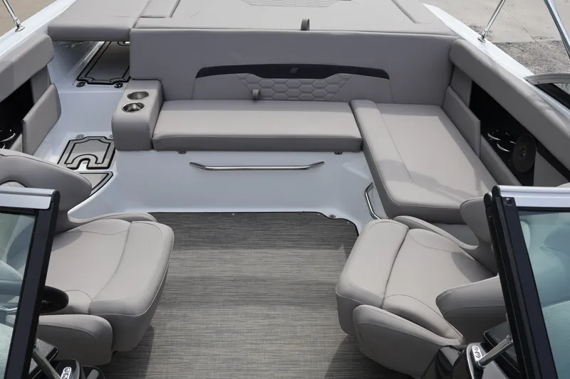 Slide: The Image of 2026 Four Winns HD2 boat interior with luxurious seating and modern design. - 18