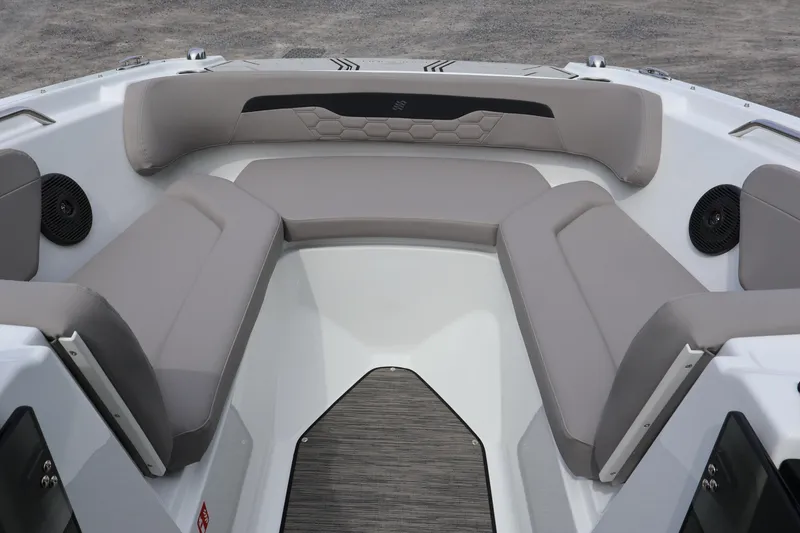 Slide: The Image of 2026 Four Winns HD2 boat interior with gray seating and modern design. - 25