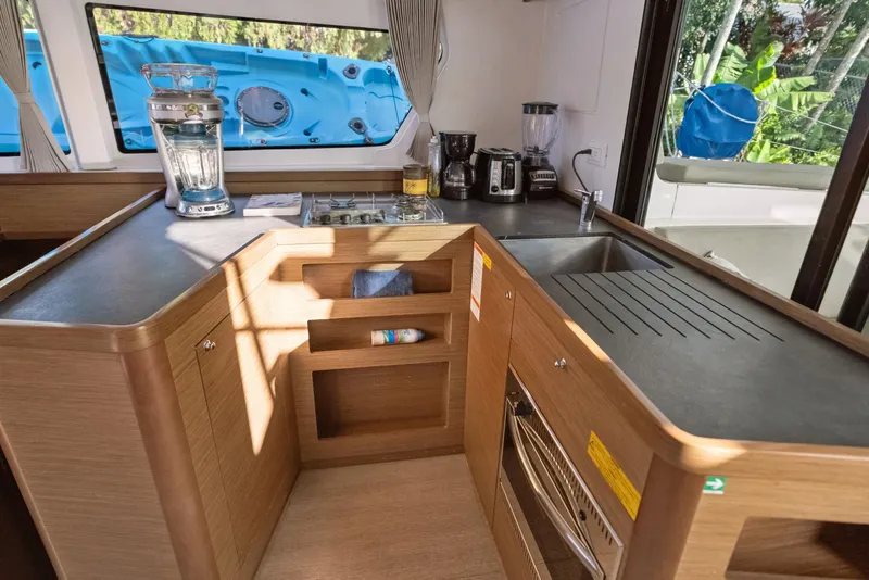 Slide: The Image of Modern kitchen interior of 2020 Lagoon 42 catamaran with appliances and sleek design. - 17