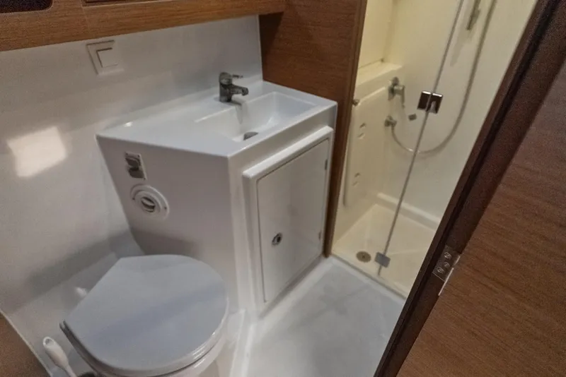 Slide: The Image of Bathroom interior of 2020 Lagoon 42 yacht with sink, toilet, and shower. - 34