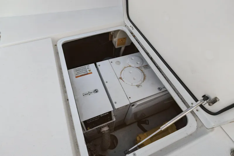 Slide: The Image of Engine compartment of a 2020 Lagoon 42 catamaran with Cummins Onan generator. - 39