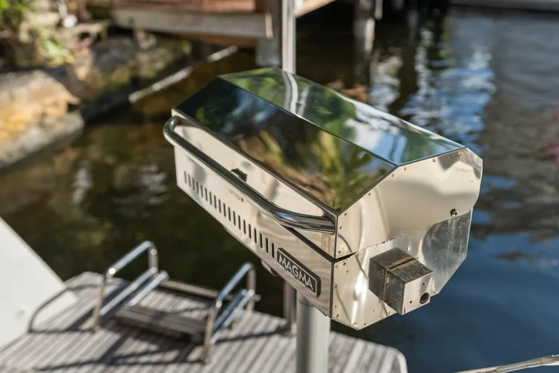 Slide: The Image of Stainless steel grill on Lagoon 42 catamaran, dockside view, 2020 model. - 42