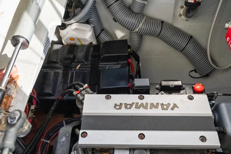 Slide: The Image of Engine compartment of a 2020 Lagoon 42 catamaran with Yanmar engine components. - 43