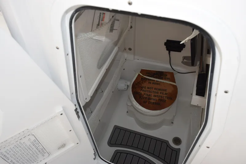 Slide: The Image of Interior view of 2026 Sea Hunt Gamefish 25 boat's storage compartment. - 14