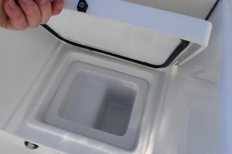 Slide: The Image of Open storage compartment on 2026 Sea Hunt Gamefish 25 boat. - 18