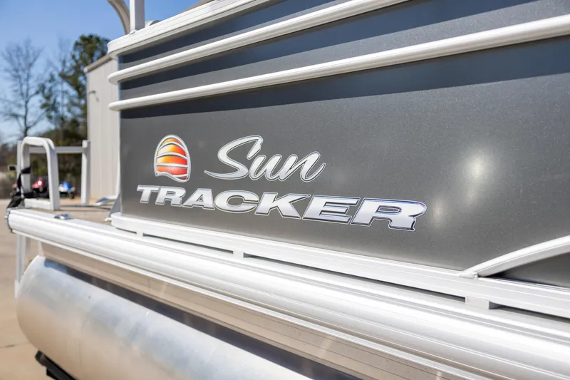 Slide: The Image of 2023 Sun Tracker Party Barge 20 DLX pontoon boat, close-up of logo and design. - 3