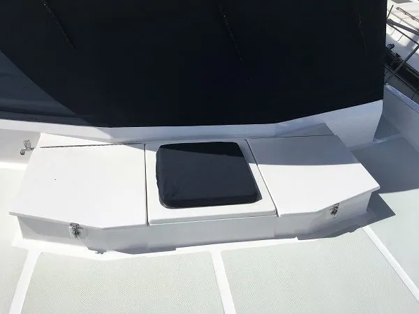 Slide: The Image of DeFever 44+5 2005 boat deck with storage compartments. - 13