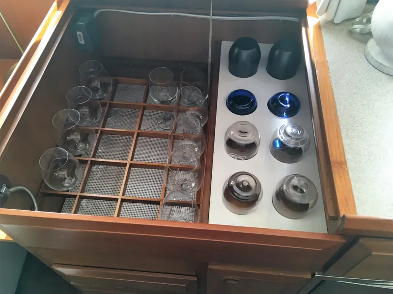 Slide: The Image of Glass and bottle holder in DeFever 44+5 yacht, year 2005. - 28