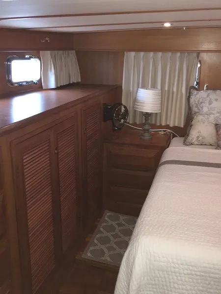 Slide: The Image of Interior of a 2005 DeFever 44+5 yacht with wooden furnishings. - 38