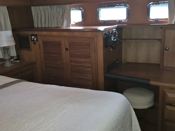 Slide: The Image of Interior of a 2005 DeFever 44+5 yacht with wooden furnishings. - 39