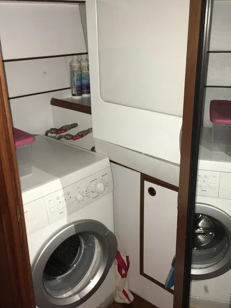 Slide: The Image of Washing machine and dryer in a 2005 DeFever 44+5 yacht. - 40