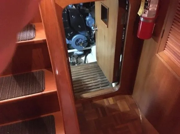 Slide: The Image of Interior of a 2005 DeFever 44+5 yacht with stairs and engine room. - 47