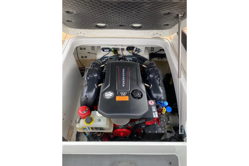 Slide: The Image of Engine compartment of 2022 Chaparral 247 SSX boat with Volvo Penta engine. - 11