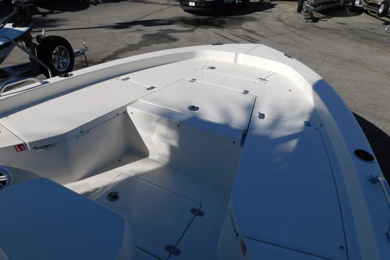 Slide: The Image of 2026 Pathfinder 2200 TRS boat interior with storage compartments and seating. - 12