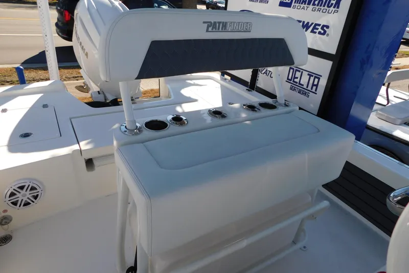 Slide: The Image of 2026 Pathfinder 2200 TRS boat interior with seating and cup holders. - 14