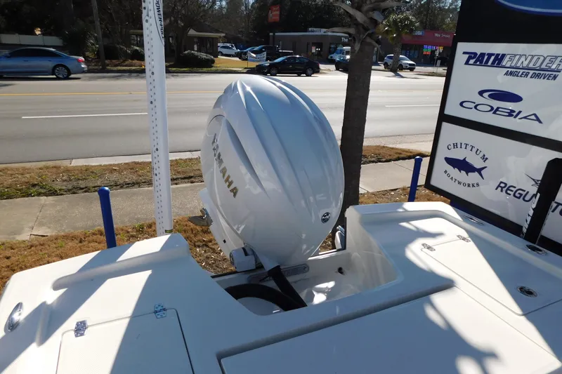 Slide: The Image of 2026 Pathfinder 2200 TRS boat with Yamaha outboard motor on display. - 15