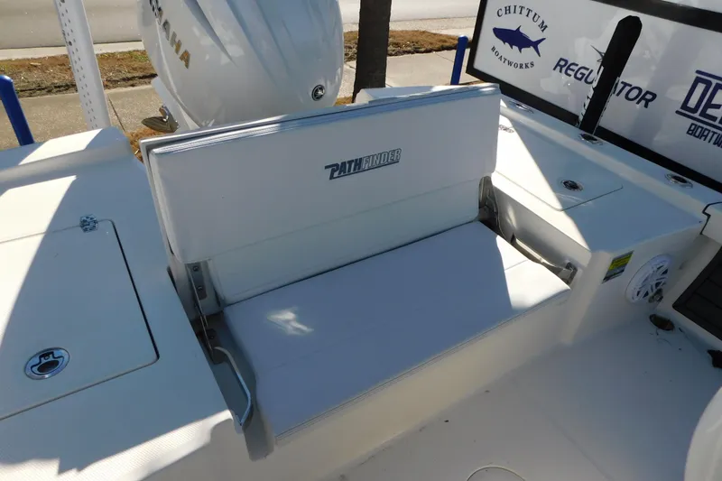 Slide: The Image of 2026 Pathfinder 2200 TRS boat interior with seating and Yamaha engine. - 16