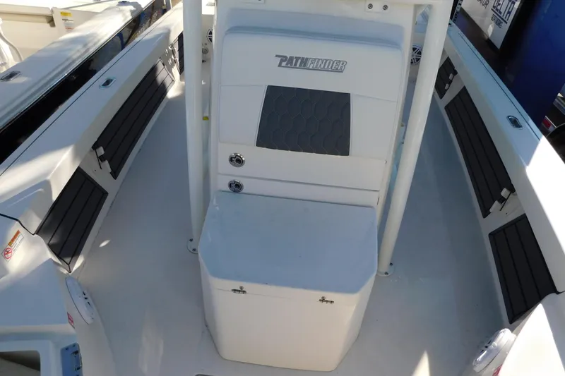 Slide: The Image of 2026 Pathfinder 2200 TRS boat interior with seating and storage compartments. - 20