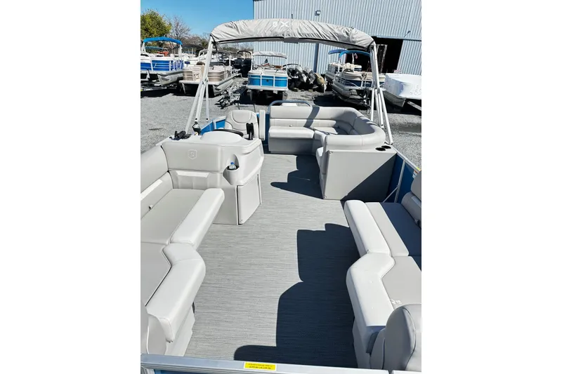 Slide: The Image of 2025 Godfrey Experience Cruise 2086CX pontoon boat with spacious seating and canopy. - 5