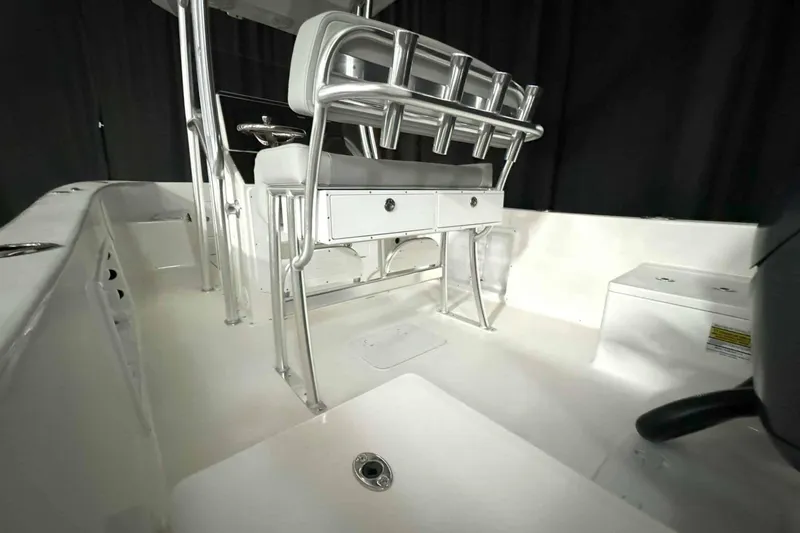 Slide: The Image of 2026 Bay Rider 21 Offshore boat interior with seating and storage compartments. - 20