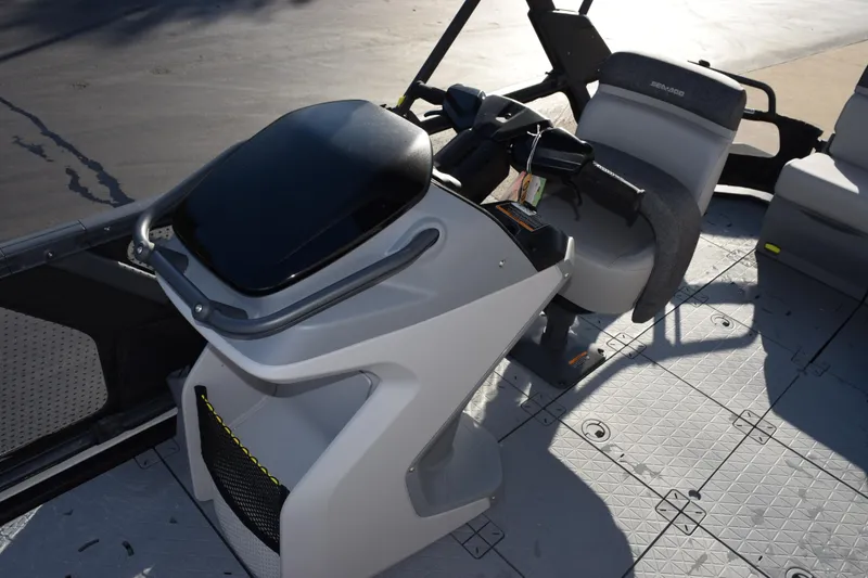 Slide: The Image of 2026 Sea-Doo Switch Cruise 21 helm with modern controls and seating. - 10