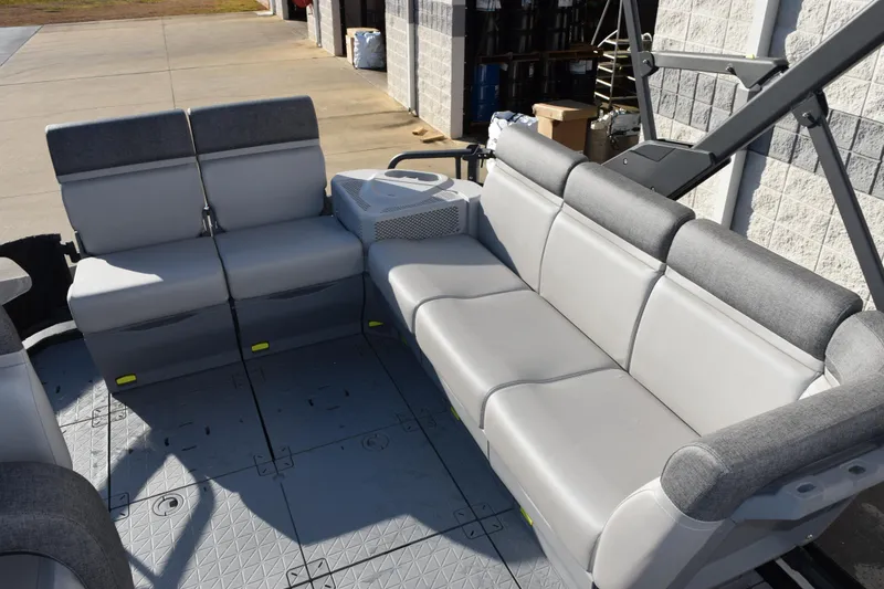 Slide: The Image of 2026 Sea-Doo Switch Cruise 21 interior seating with gray upholstery and spacious layout. - 11