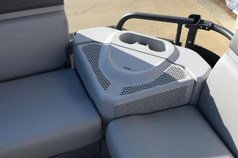 Slide: The Image of 2026 Sea-Doo Switch Cruise 21 interior seating with integrated storage and cup holder. - 12