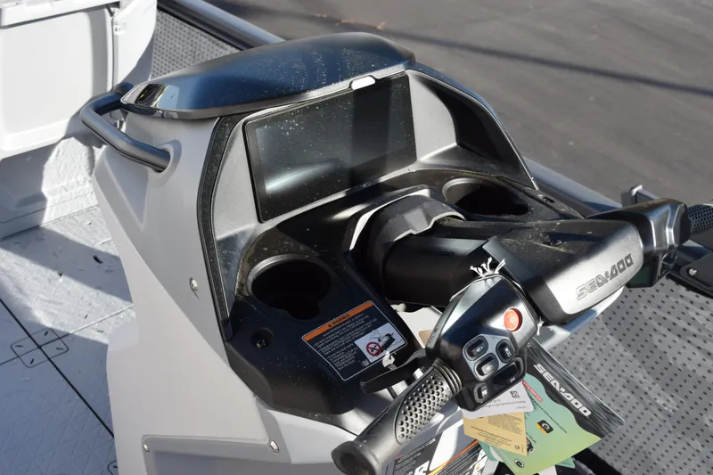 Slide: The Image of 2026 Sea-Doo Switch Cruise 21 dashboard with steering controls and display screen. - 14