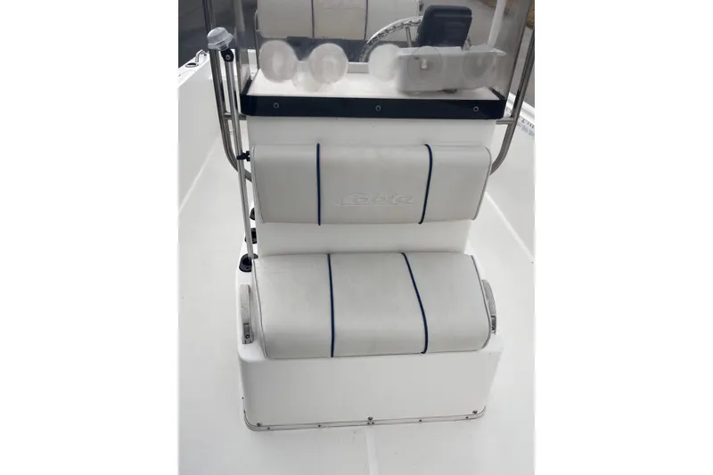 Slide: The Image of 2003 Cobia 184 Center Console boat seating and console detail. - 22