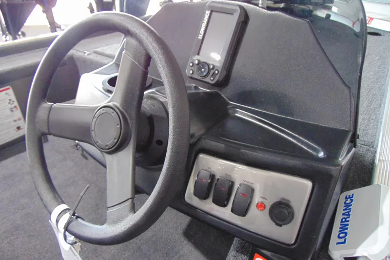 Slide: The Image of Steering console of 2026 Crestliner 1600 Storm boat with Lowrance electronics. - 15