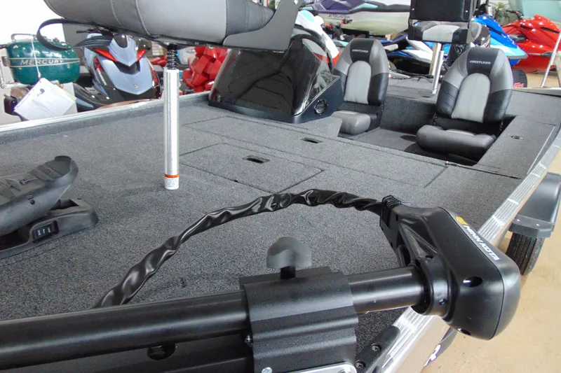 Slide: The Image of 2026 Crestliner 1600 Storm boat interior with seating and trolling motor. - 4