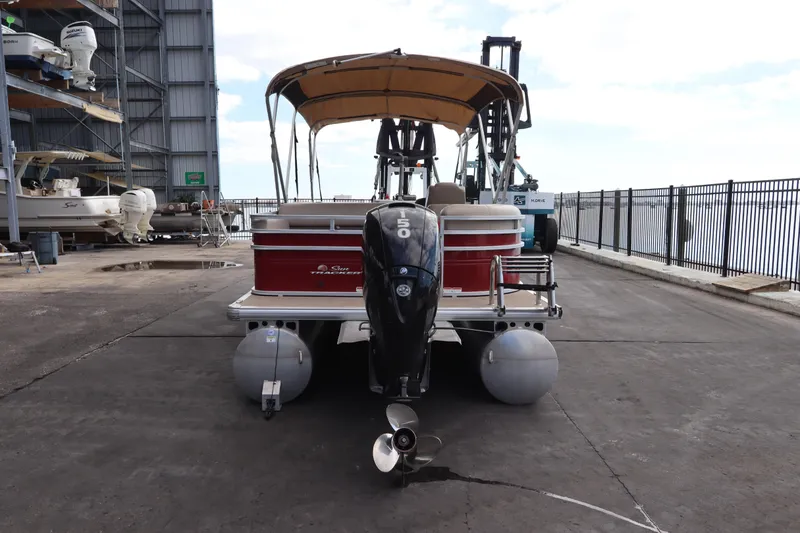 Slide: The Image of 2024 Sun Tracker Party Barge 22 DLX pontoon boat with canopy and outboard motor. - 7