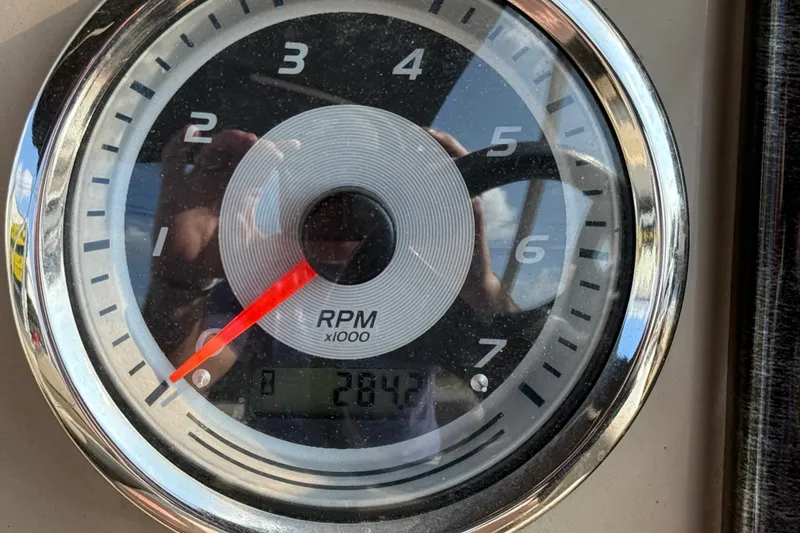 Slide: The Image of Close-up of a 2019 Avalon Venture 1880 CRB tachometer showing 2842 RPM. - 20