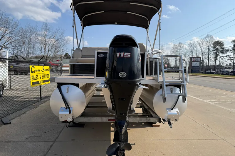 Slide: The Image of 2019 Avalon Venture 1880 CRB pontoon boat with 115 HP engine at sales lot. - 6
