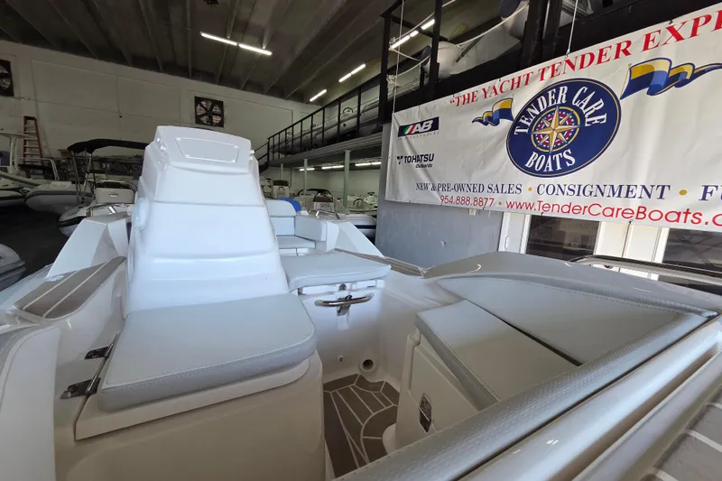 Slide: The Image of 2023 Zar ZF-0 boat with Suzuki 40HP engine displayed at Tender Care Boats showroom. - 3