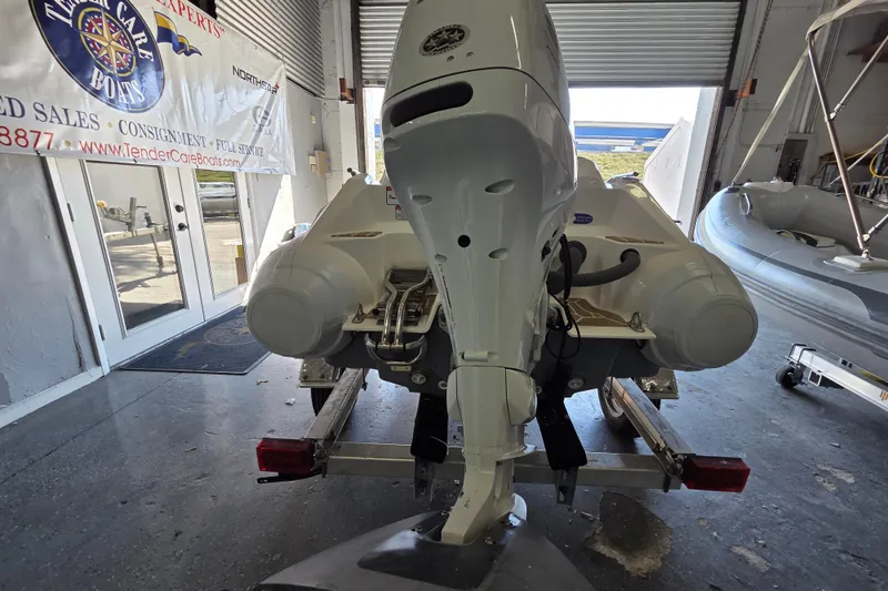 Slide: The Image of 2023 Zar ZF-0 boat with Suzuki 40HP engine in showroom. - 5