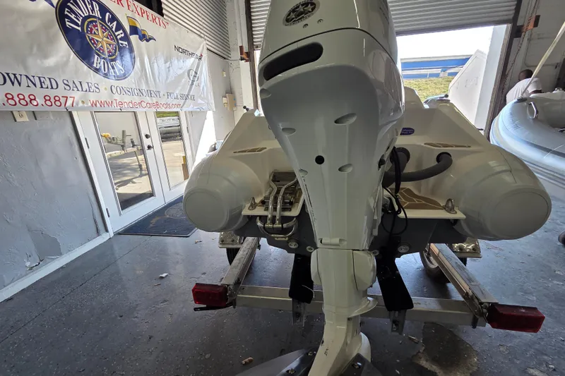 Slide: The Image of 2023 Zar ZF-0 boat with Suzuki 40HP engine in showroom. - 7