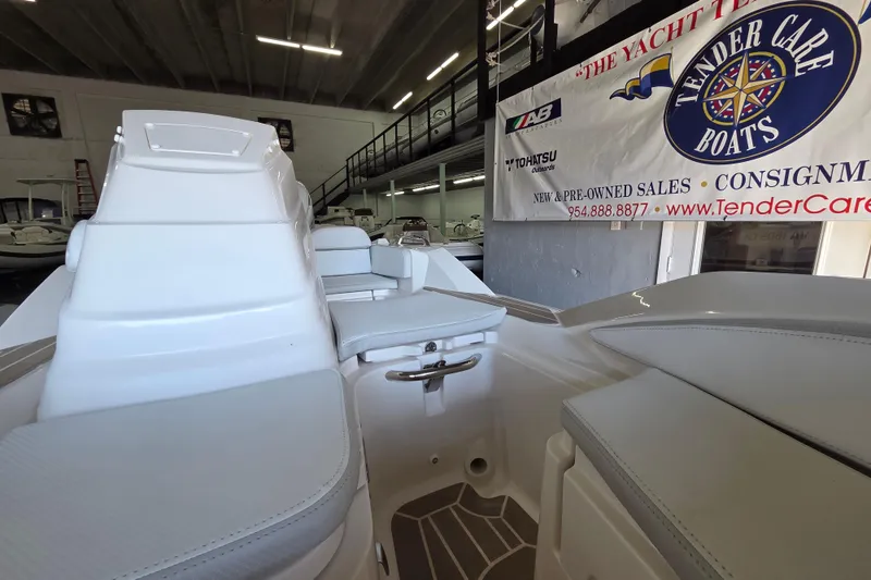 Slide: The Image of 2023 Zar ZF-0 boat with Suzuki 40HP engine displayed at Tender Care Boats showroom. - 8