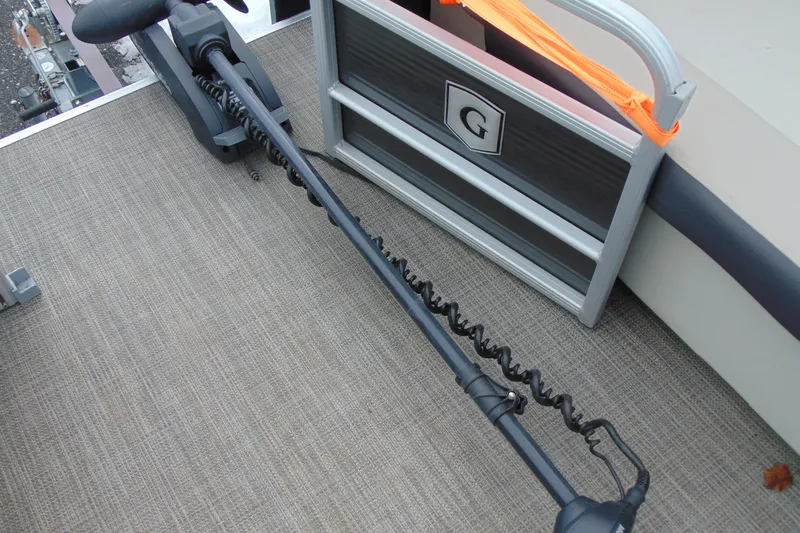 Slide: The Image of 2019 Godfrey SW 180C boat deck with trolling motor and gate. - 22