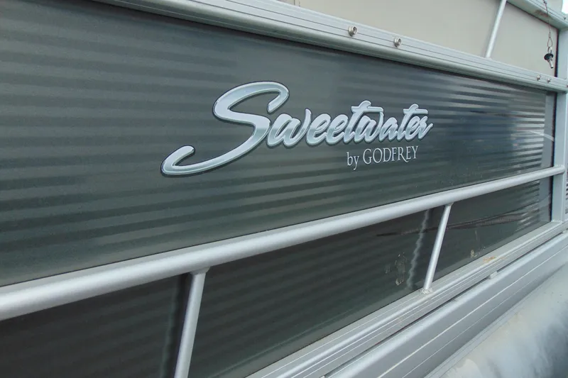 Slide: The Image of 2019 Godfrey Sweetwater SW 180C pontoon boat side view with logo. - 5
